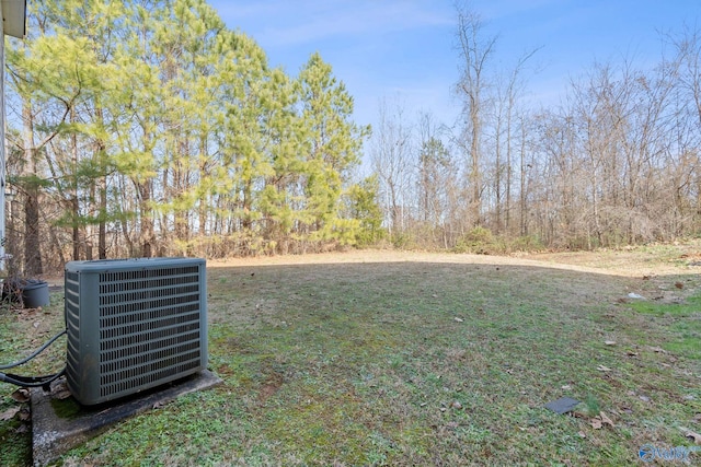 view of yard with central AC