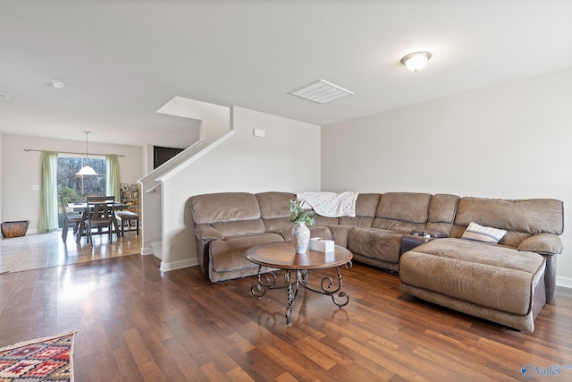 living room with dark wood-type flooring