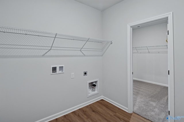 clothes washing area featuring hookup for an electric dryer, wood-type flooring, and hookup for a washing machine