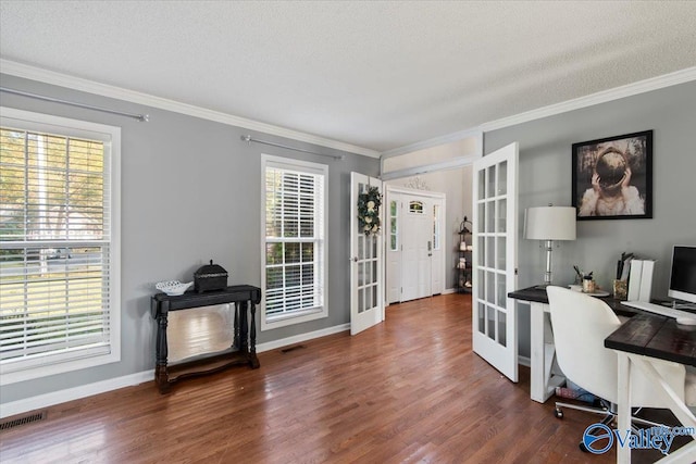 office space with french doors, crown molding, a textured ceiling, and dark hardwood / wood-style flooring