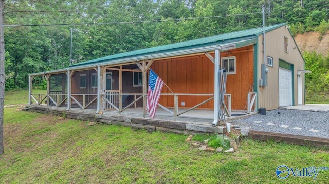 1228 Matt Morrow Rd, Arab, AL 35016 - view of outbuilding with a wooded view