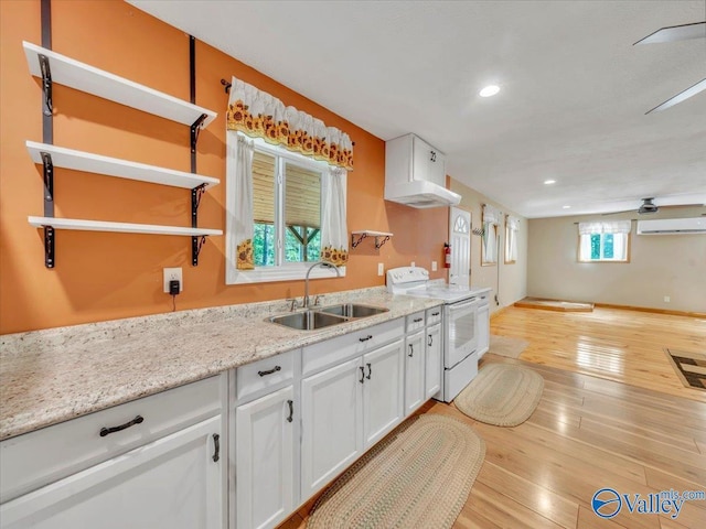 1228 Matt Morrow Rd, Arab, AL 35016 - kitchen featuring white electric range, open shelves, white cabinets, recessed lighting, and light wood finished floors