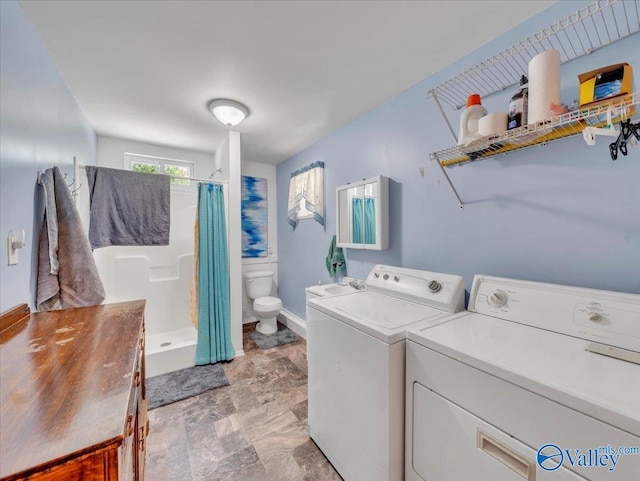 1228 Matt Morrow Rd, Arab, AL 35016 - washroom featuring washer and dryer and stone finish flooring