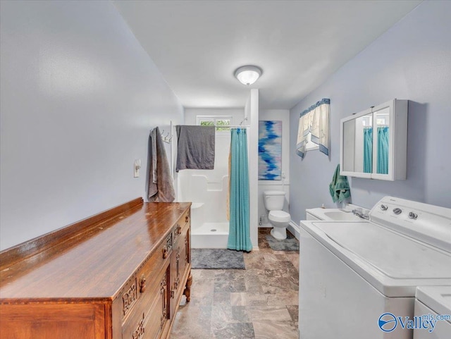 1228 Matt Morrow Rd, Arab, AL 35016 - full bathroom featuring vanity, a shower with shower curtain, independent washer and dryer, and stone finish flooring