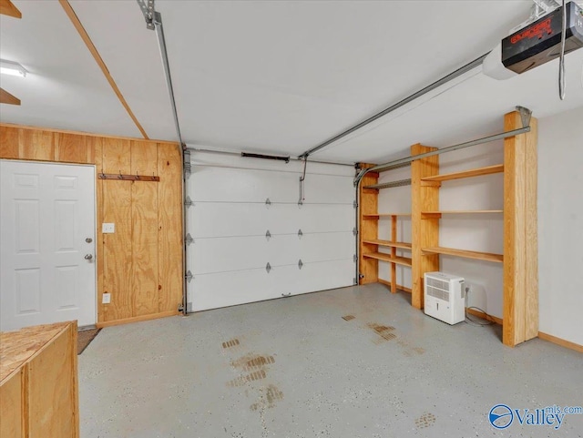 1228 Matt Morrow Rd, Arab, AL 35016 - garage featuring a garage door opener and baseboards
