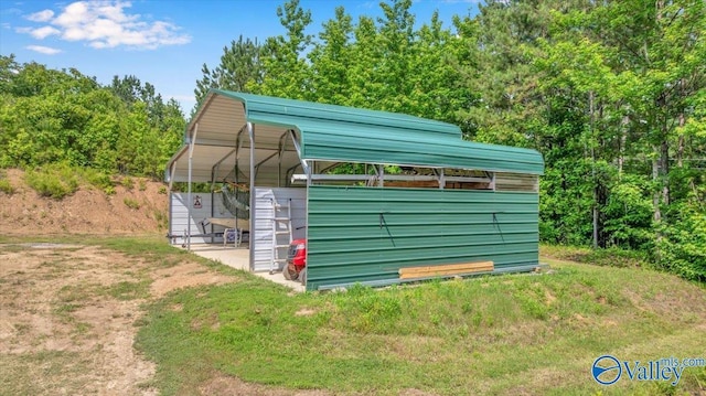 1228 Matt Morrow Rd, Arab, AL 35016 - view of outdoor structure featuring a detached carport