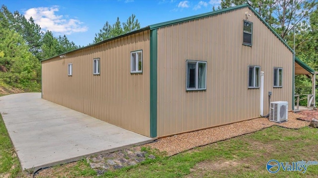 1228 Matt Morrow Rd, Arab, AL 35016 - view of side of home featuring an ac unit and a patio area