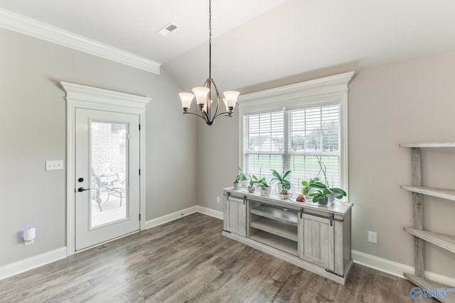 14537 Willow Bend Dr, Athens, AL 35613 - foyer featuring a chandelier, dark wood-style floors, baseboards, crown molding, and lofted ceiling