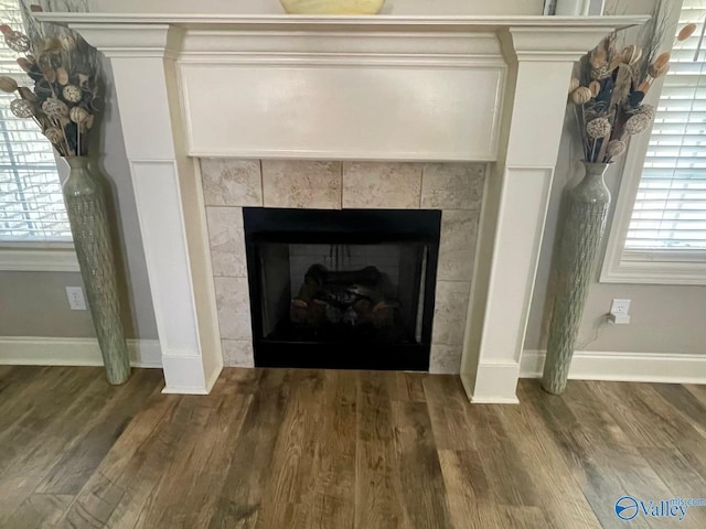 14537 Willow Bend Dr, Athens, AL 35613 - detailed view of wood finished floors, a fireplace, and baseboards