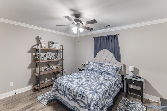 14537 Willow Bend Dr, Athens, AL 35613 - bedroom featuring ornamental molding, baseboards, wood finished floors, and ceiling fan