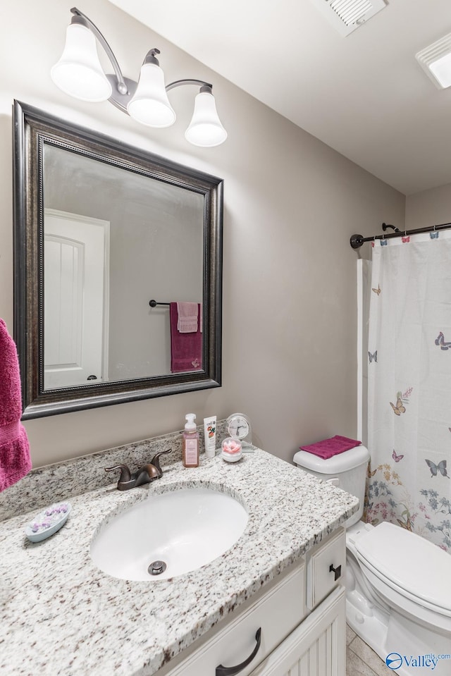 14537 Willow Bend Dr, Athens, AL 35613 - full bathroom with vanity, toilet, and curtained shower