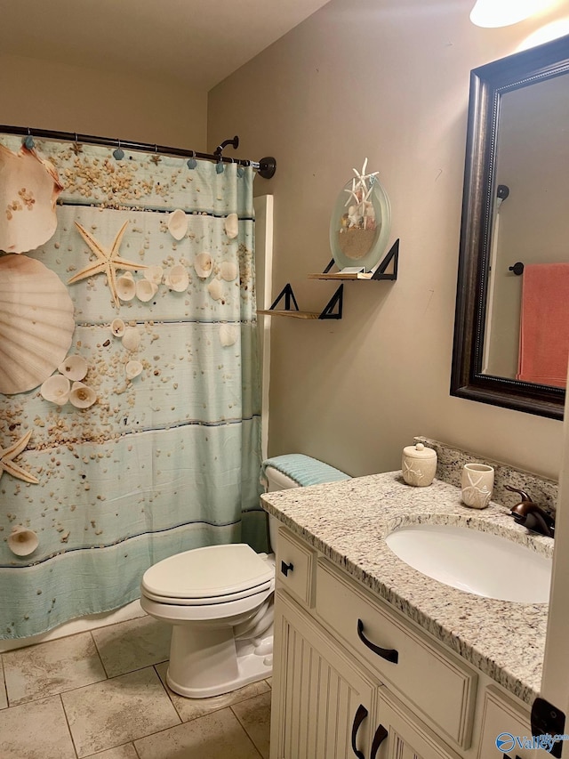 14537 Willow Bend Dr, Athens, AL 35613 - bathroom with toilet, vanity, a shower with curtain, and tile patterned floors