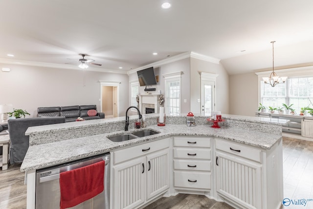 14537 Willow Bend Dr, Athens, AL 35613 - kitchen featuring stainless steel dishwasher, a sink, open floor plan, ceiling fan, and a chandelier