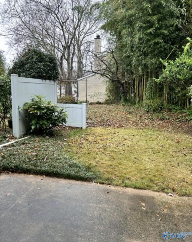 view of yard featuring fence