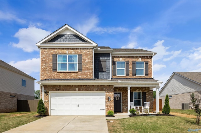 162 Morning Dew Rd, Toney, AL 35773 - craftsman inspired home with covered porch, an attached garage, driveway, central AC unit, and brick siding