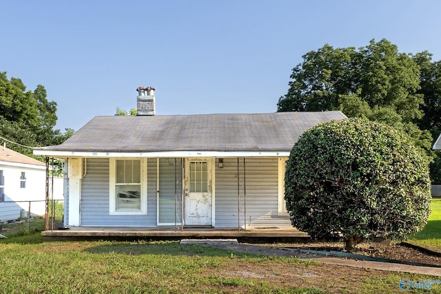 3509 7th Ave, Huntsville, AL 35805 - view of front facade featuring covered porch and a chimney