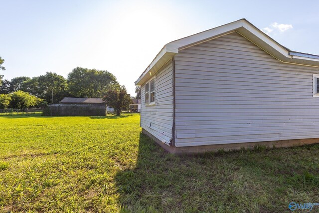 3509 7th Ave, Huntsville, AL 35805 - view of side of property with a lawn