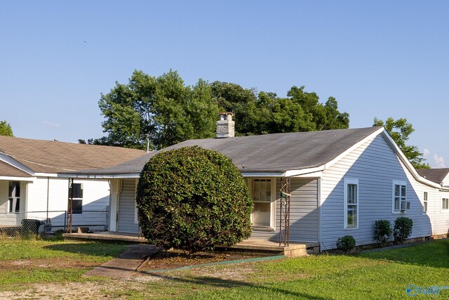 3509 7th Ave, Huntsville, AL 35805 - view of front of property featuring a front lawn and a chimney