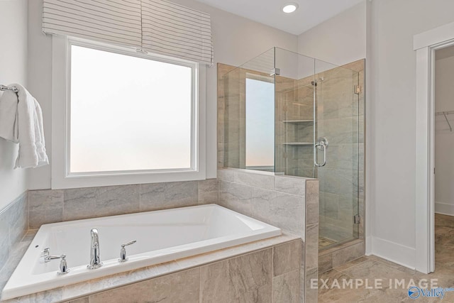 bathroom featuring plus walk in shower