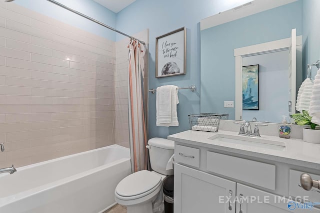 full bathroom featuring vanity, toilet, and shower / bath combo with shower curtain