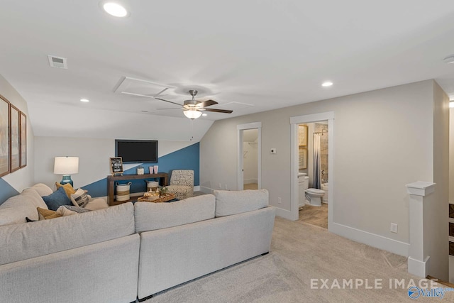 living room featuring ceiling fan and light carpet