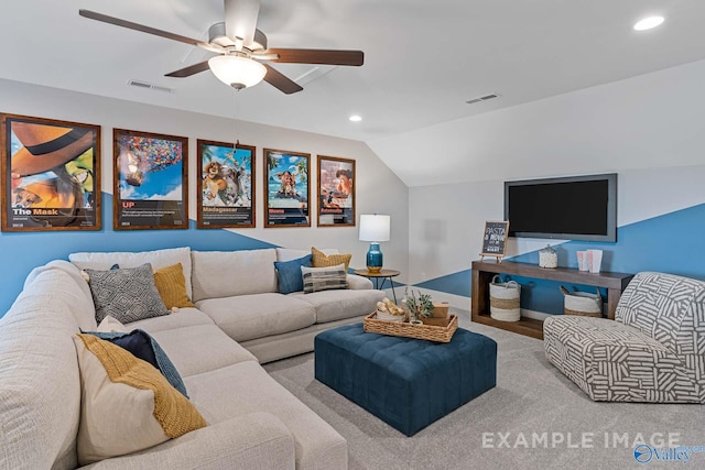 living room featuring vaulted ceiling and ceiling fan