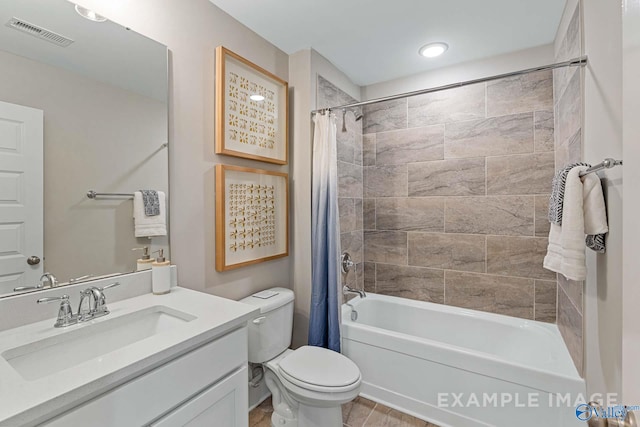 full bathroom featuring vanity, toilet, and shower / bathtub combination with curtain