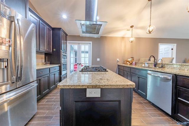 4198 Pilgrims Rest Rd, Southside, AL 35907 - kitchen featuring appliances with stainless steel finishes, a sink, wood finish floors, a center island, and light stone countertops