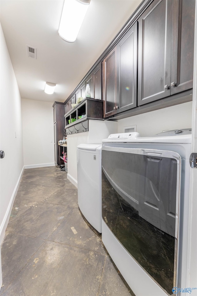 4198 Pilgrims Rest Rd, Southside, AL 35907 - laundry area with cabinet space, washing machine and clothes dryer, and baseboards