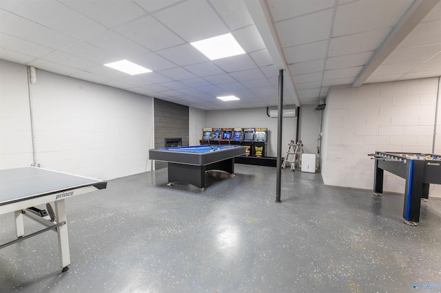 4198 Pilgrims Rest Rd, Southside, AL 35907 - recreation room with concrete block wall, billiards, speckle patterned floor, a paneled ceiling, and a fireplace
