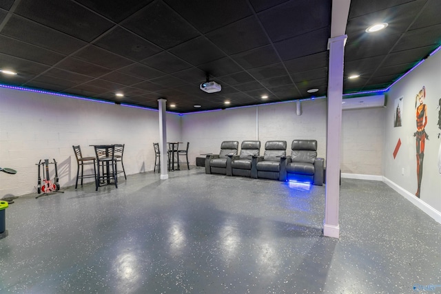 4198 Pilgrims Rest Rd, Southside, AL 35907 - home theater featuring concrete block wall, a drop ceiling, and baseboards