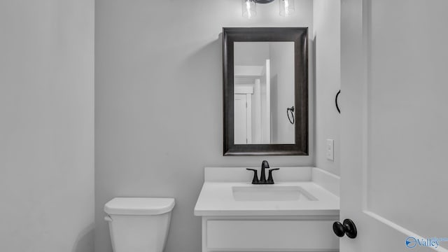 130 Iberville St, Madison, AL 35758 - bathroom with toilet and vanity