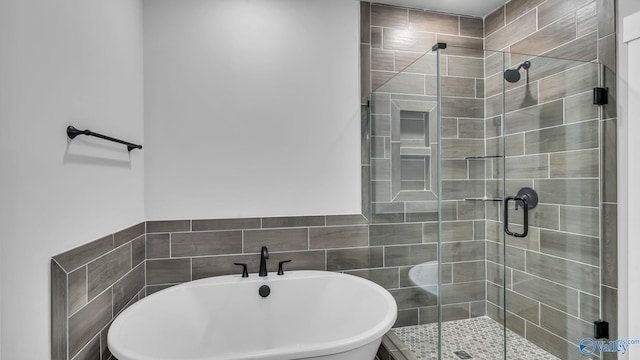130 Iberville St, Madison, AL 35758 - bathroom with a soaking tub and a shower stall