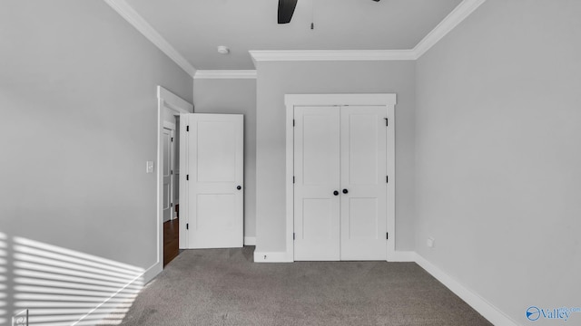 130 Iberville St, Madison, AL 35758 - unfurnished bedroom with ornamental molding, carpet floors, a closet, and ceiling fan