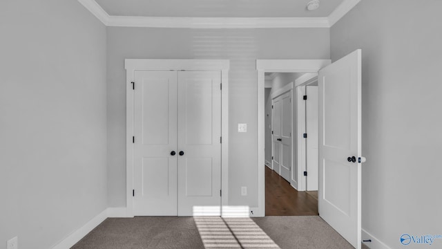 130 Iberville St, Madison, AL 35758 - unfurnished bedroom with ornamental molding, carpet flooring, and a closet