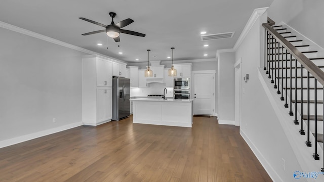 130 Iberville St, Madison, AL 35758 - kitchen with stainless steel appliances, a ceiling fan, dark wood-style floors, crown molding, and white cabinetry