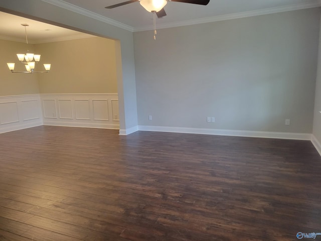 spare room featuring ceiling fan with notable chandelier, wood-type flooring, and ornamental molding