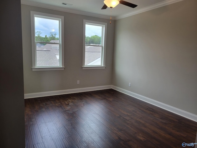 unfurnished room featuring ceiling fan, dark hardwood / wood-style flooring, and ornamental molding