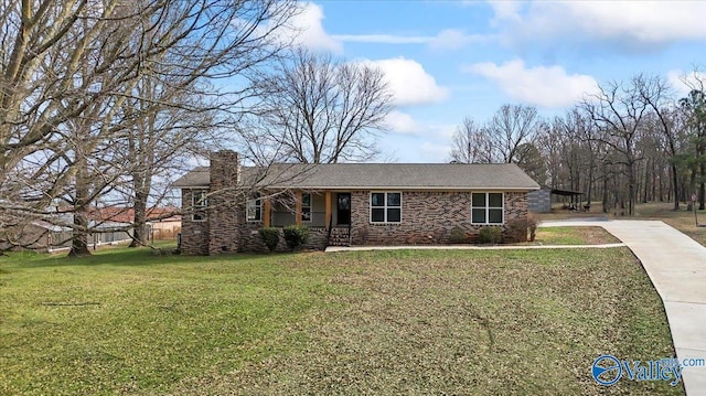 single story home with a front yard