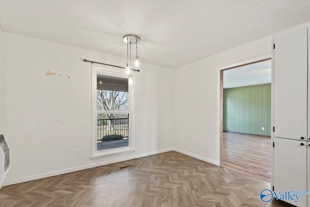 unfurnished dining area with parquet floors