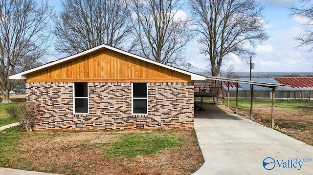 view of home's exterior featuring a carport