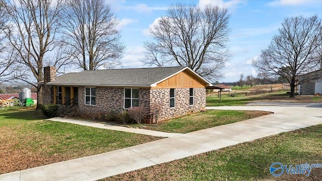 view of home's exterior with a lawn