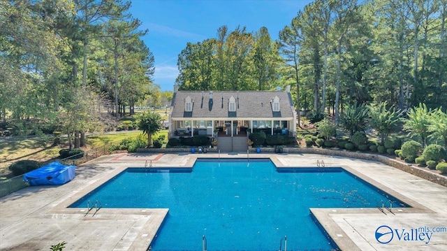 view of pool with a patio area