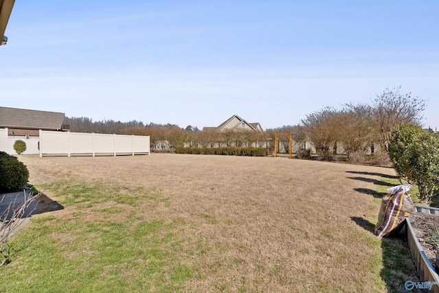 view of yard with fence