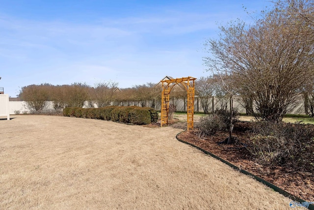 view of yard with fence