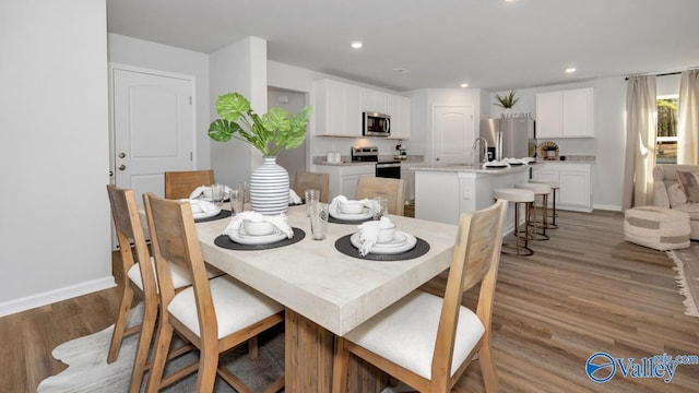 18876 Wicklow Cir, Athens, AL 35613 - dining area featuring light hardwood / wood-style floors