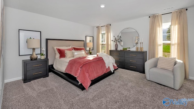 18876 Wicklow Cir, Athens, AL 35613 - bedroom featuring light colored carpet