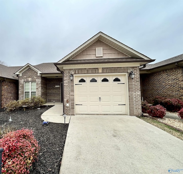 single story home featuring a garage