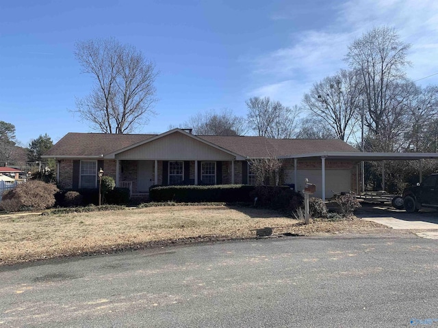 single story home featuring a carport