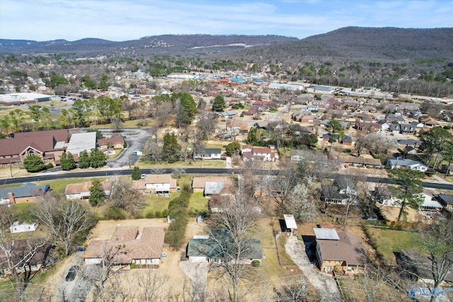 birds eye view of property featuring a mountain view and a residential view